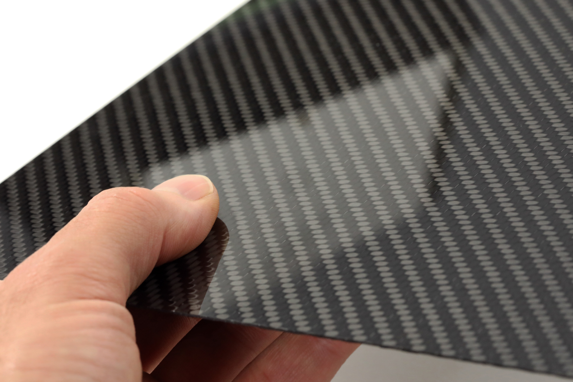 carbon fiber shop 32 carbon fiber shop -carbon fiber shop CFS carbon fibre sheet in hand reflection